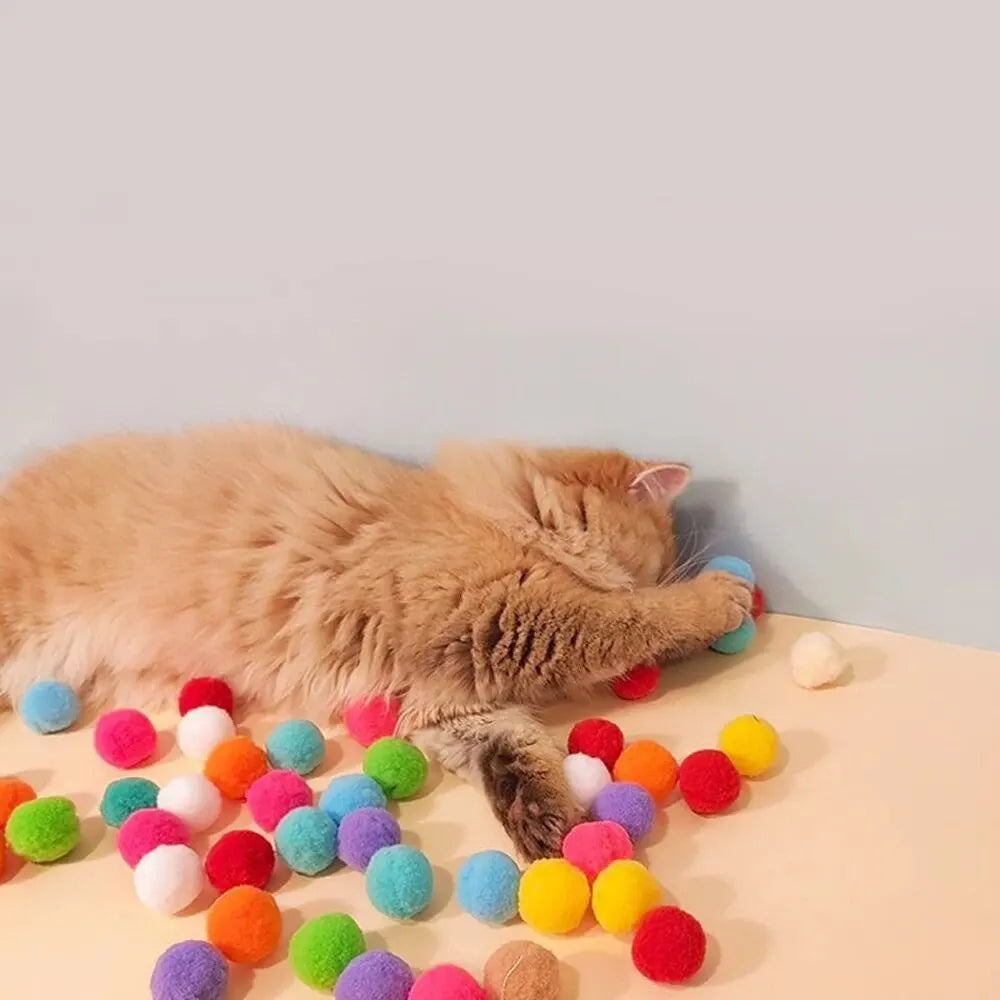 Interactive cat toy gun with 20 plush balls – fun and quiet play